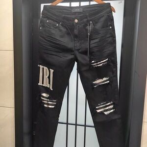 Amiri Black Tie-Dye Core Applique Logo Jeans